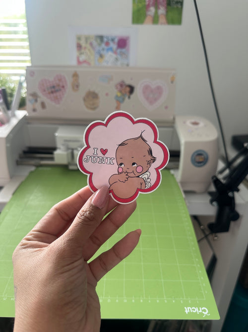 "i love junk" kewpie sticker